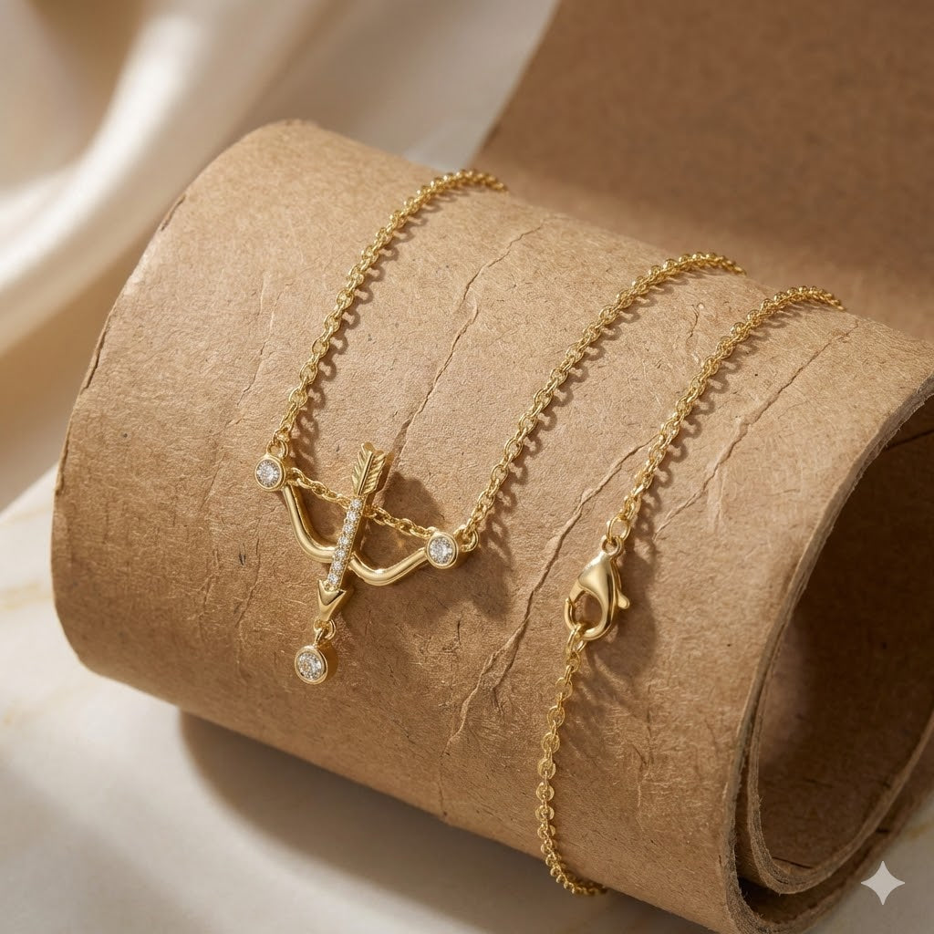 Sparkling Gold Bow & Arrow Drop Necklace