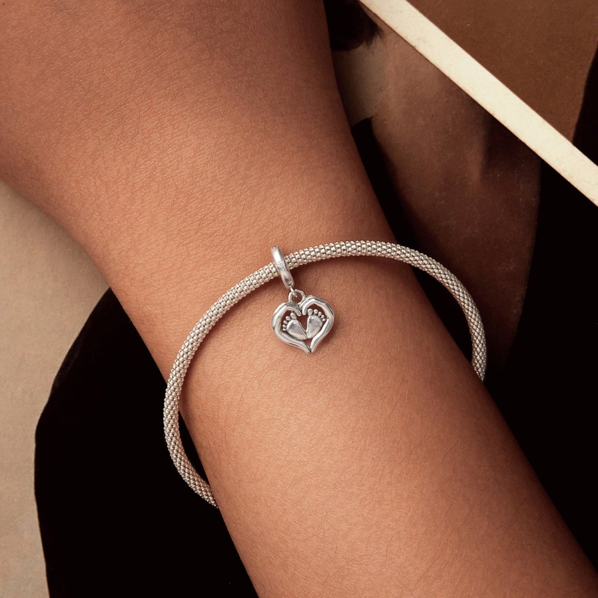 Baby Feet in Heart Hands Dangle Charm