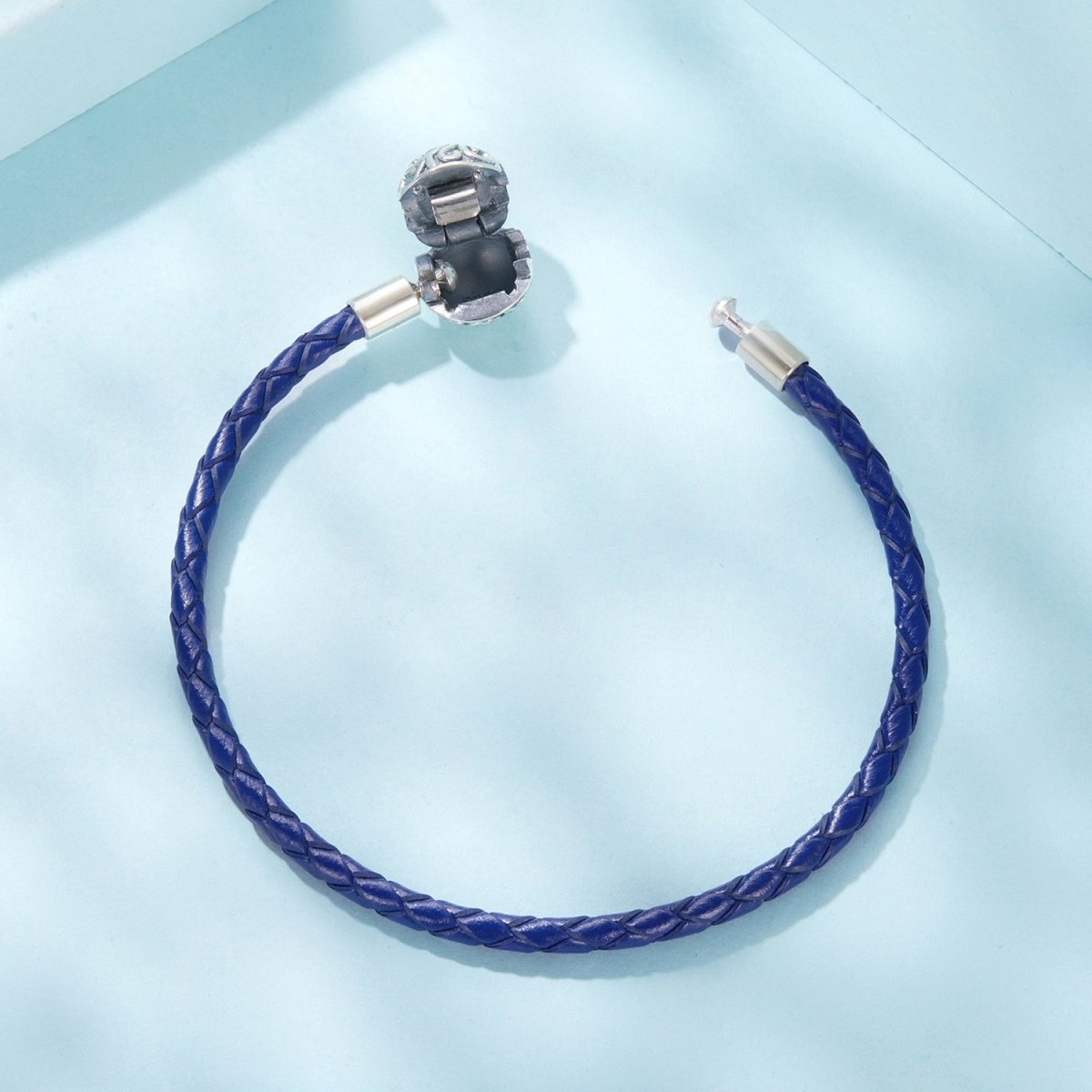 Blue Swirl Clasp Leather Charm Bracelet