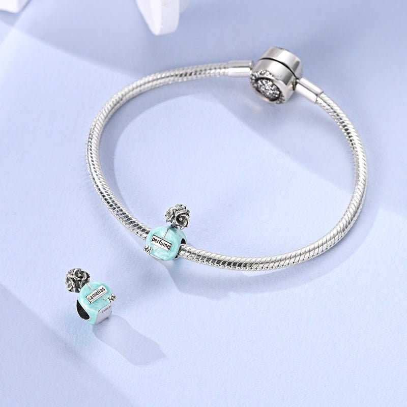 Elegant Blue Perfume Bottle Charm