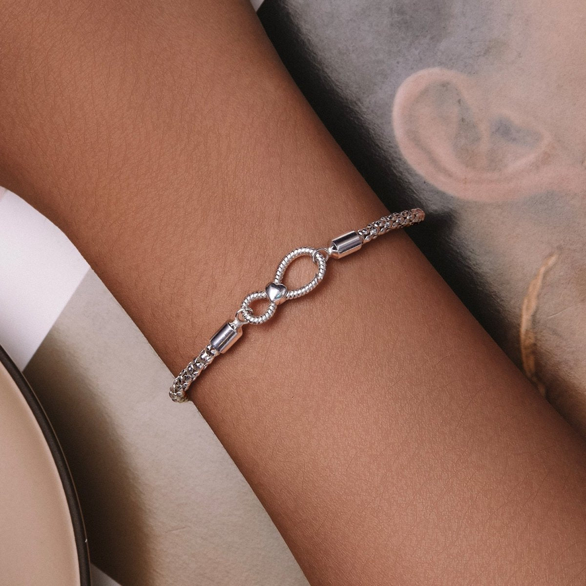 Infinity Clasp Woven Charm Bracelet