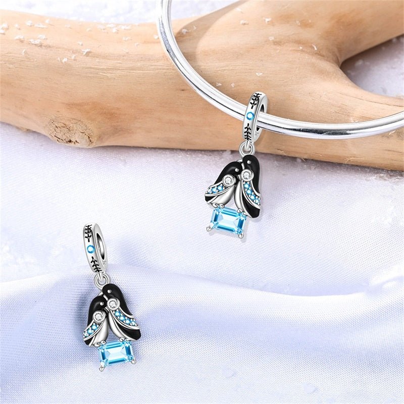 Penguin Couple with Blue Crystal Dangle Charm