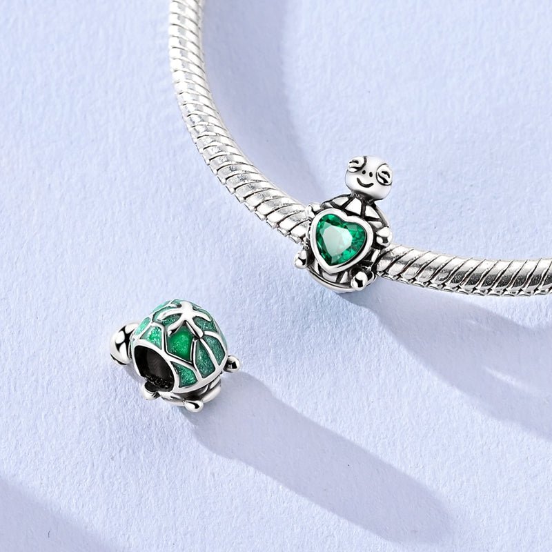 Smiling Turtle with Green Heart Charm