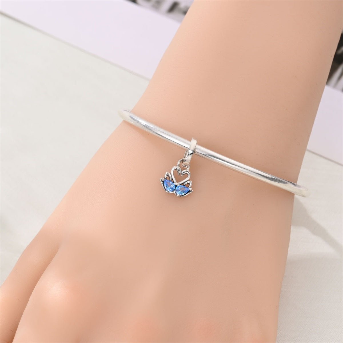 Two Swans with Blue Heart Crystals Dangle Charm