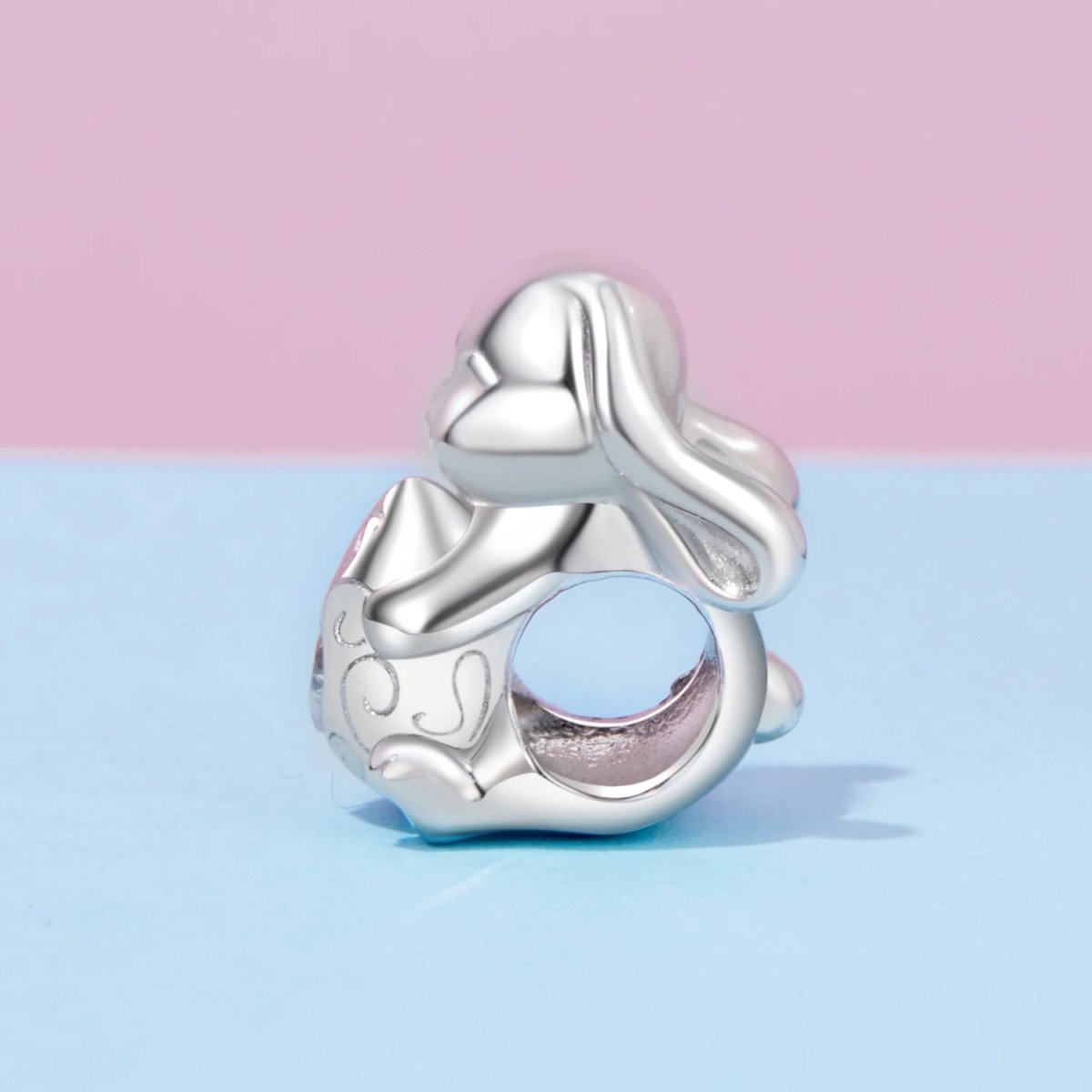 Winking Bunny with Heart-Shaped Egg Charm