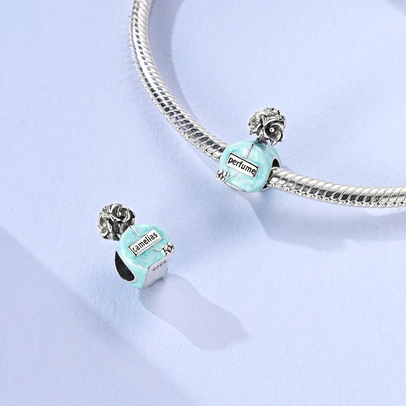 Elegant Blue Perfume Bottle Charm