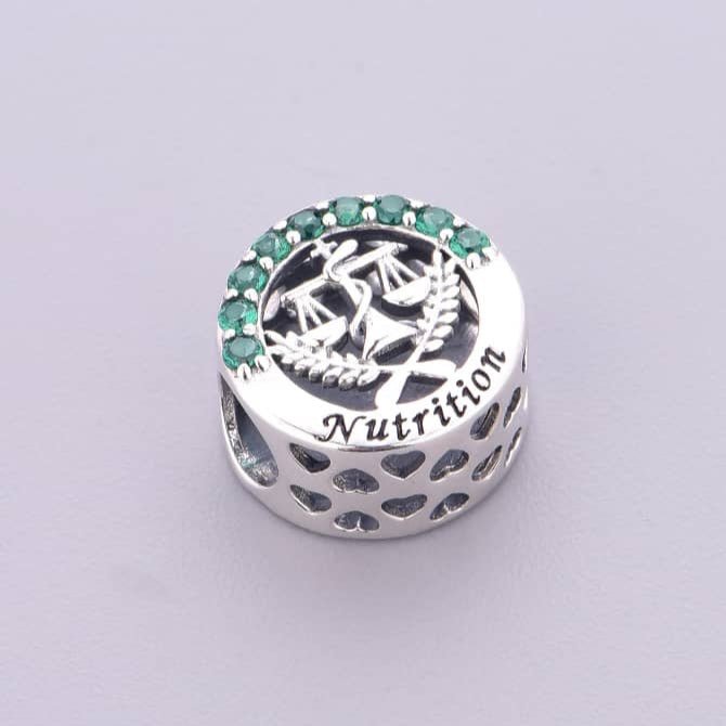 Nutrition Symbol with Green Crystals Charm