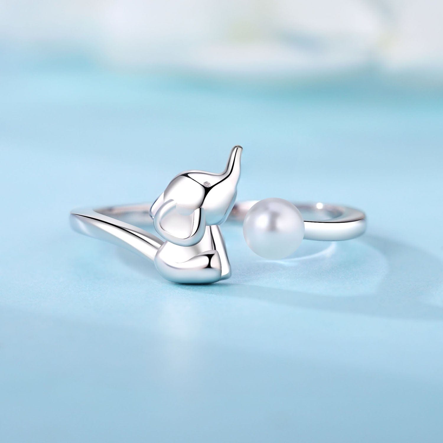 Pearl Bow Ring with Delicate Knot Design