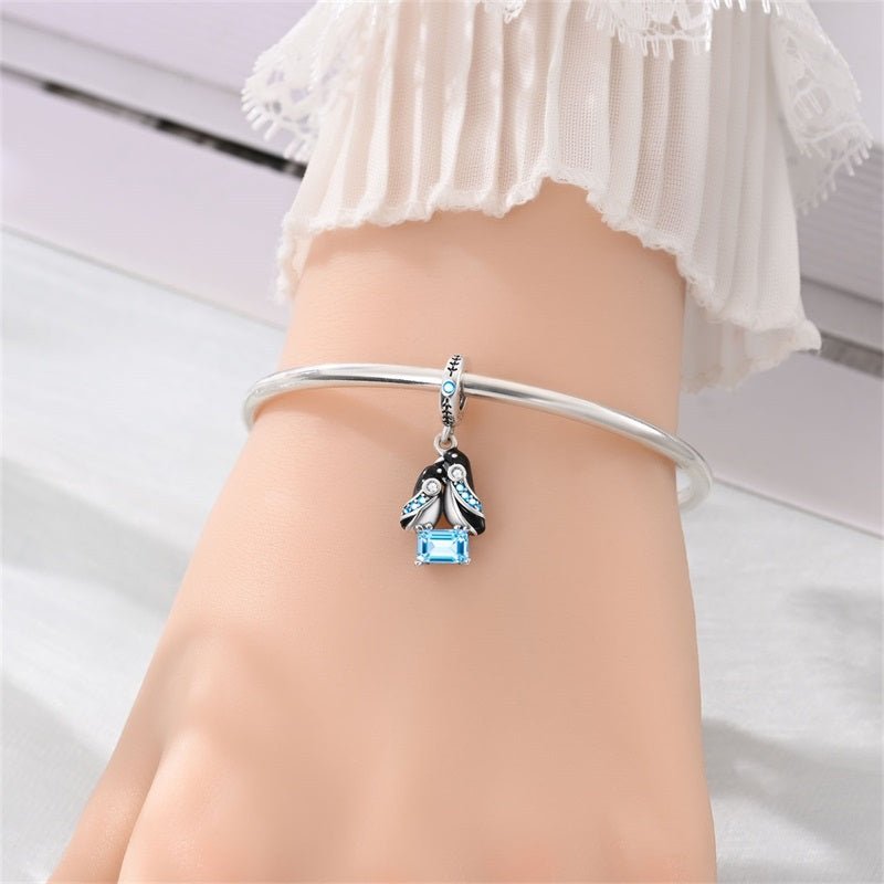 Penguin Couple with Blue Crystal Dangle Charm