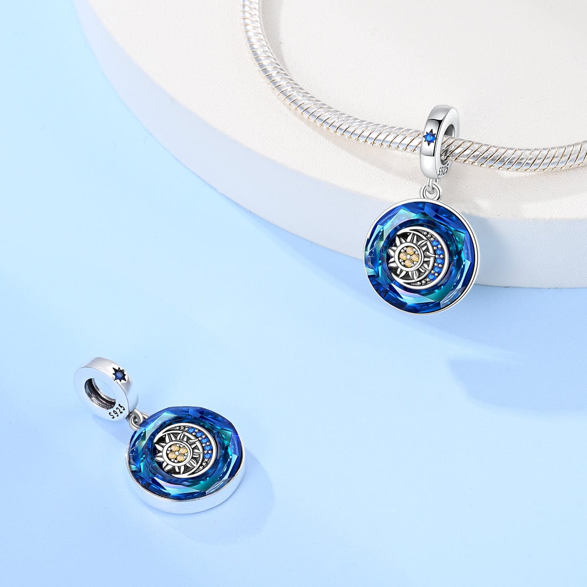 Sapphire Blue Crystal Charm with Sun & Moon Accent