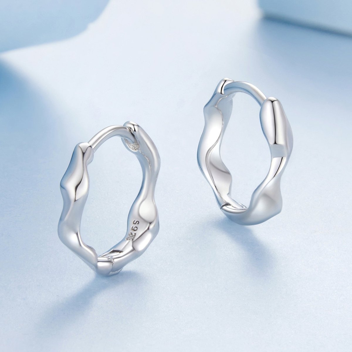Sculpted Silver Wave Hoop Earrings