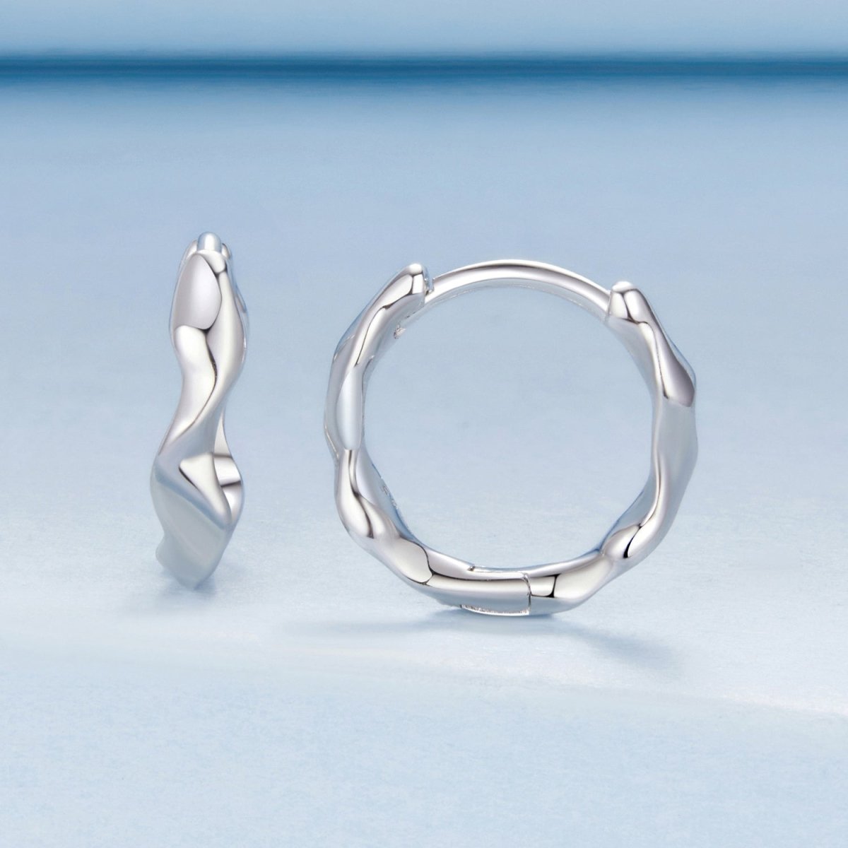 Sculpted Silver Wave Hoop Earrings