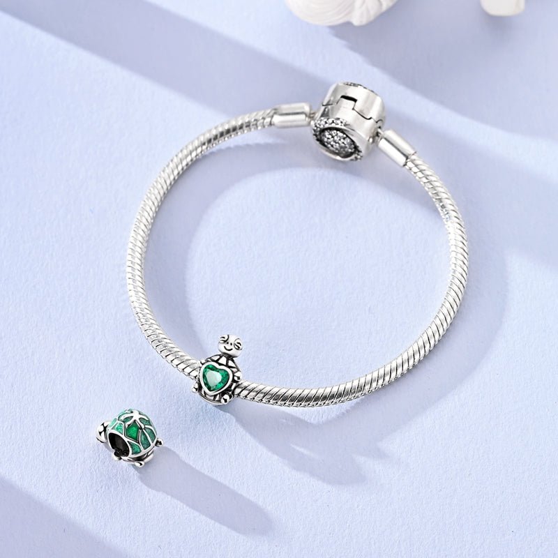 Smiling Turtle with Green Heart Charm