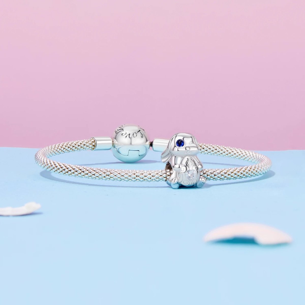 Winking Bunny with Heart-Shaped Egg Charm